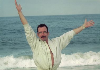 Greg practicing life guard signals in Rehoboth Beach, 1990